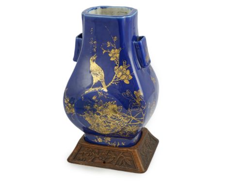 A Chinese gilt decorated blue ground vase, Hu, Guangxu mark and of the period (1875-1908), gilt decorated with a bird perched