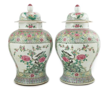 A pair of large Chinese famille rose baluster jars and covers, Qianlong seal mark, but late 19th century, each painted with p