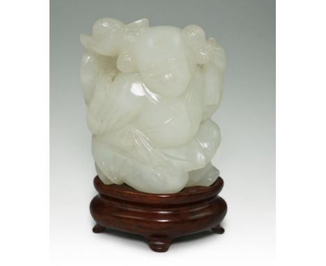 A Chinese white jade figure of a kneeling boy holding lingzhi fungus, 19th century, the stone of good even tone, 5cm highProv