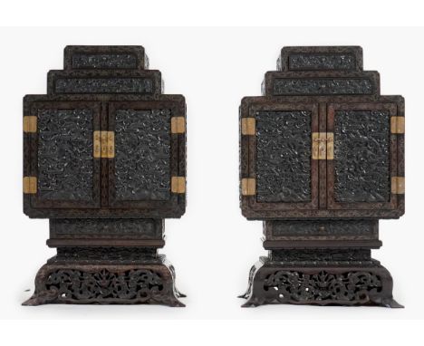 An important pair of Chinese carved zitan and silver wire inlaid ‘cloud and dragon’ curio cabinets and stands, duobaoge, prob