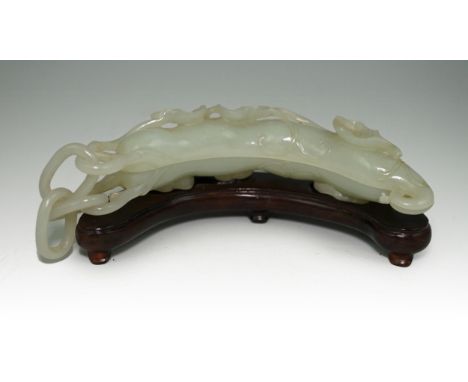 An unusual Chinese white jade ‘bean pod’ box and cover, 18th-19th century, modelled as a bean pod carved in relief and openwo