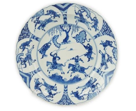 A Chinese blue and white ‘Yang Jia Jiang’ dish, Kangxi period (1662-1722), painted with warriors on horseback, the rim with s