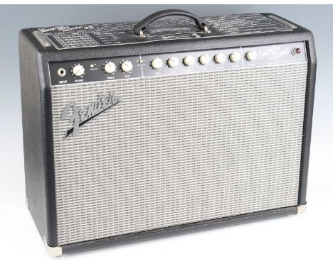 A Fender Super Sonic 22 amplifier, made in the U.S.A., serial no. CR-349885, with outer cover, w.62, d.24, h.45cm, together w