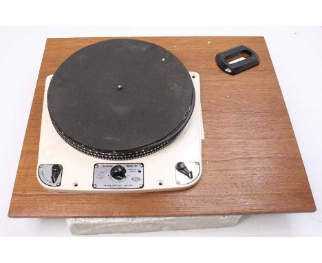 A Garrard Model 301 transcription turntable, Schedule No. 51400/1, serial no.34331 on a teak base board, with Garrard Invoice