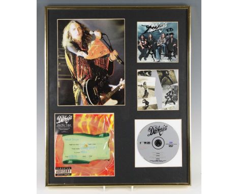 The Darkness - a framed presentation to include Love Is Only A Feeling CD signed by the band to the sleeve mounted with a One