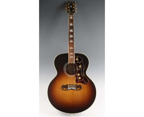 A Gibson Standard SJ-200 electro acoustic guitar, serial no.11252055, in sunburst finish, having a maple back and sides, moth