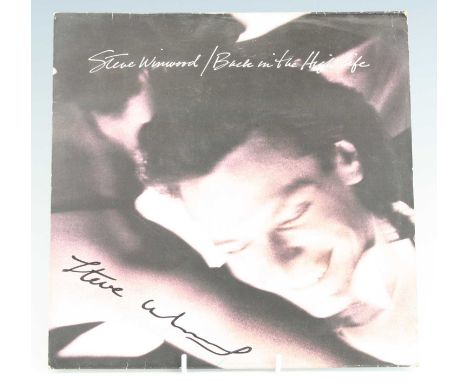 A large collection of assorted LPs, various dates and genres, to include Steve Winwood Back In The High Life (signed to the c