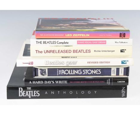 A collection of music related books to include Crouch, Glenn: Treasures Of The Rolling Stones, Turner, Steve: A Hard Day's Wi