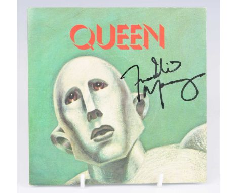 Queen - We Will Rock You / We Are The Champions, 1977 UK 7" single, EMI 2708, signed boldly to the front of the sleeve Freddi