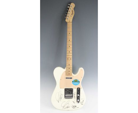 A Fender Squier Affinity Series telecaster six string electric guitar, in cream finish, serial number CY090303903, signed by 