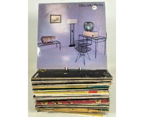 A collection of assorted LPs, various dates and genres to include Elvis - That's the way it is, Separate Ways, The John Harri