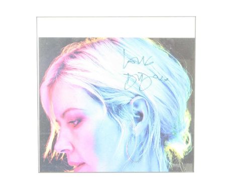 Dido (Dido Florian Cloud de Bounevialle O'Malley Armstrong b.1971), a colour portrait photograph, signed in black marker, fra