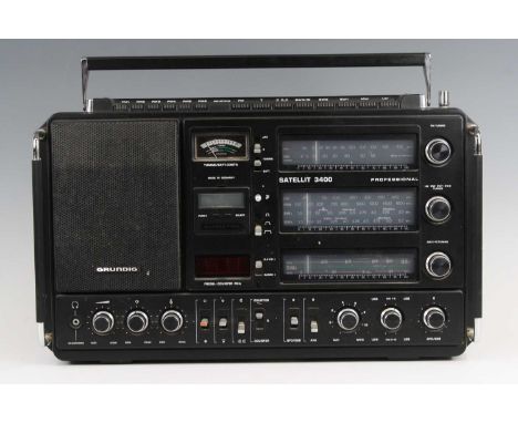 A Grundig Satellit 3400 Professional radio, with mains lead and instruction manual, w.51, d.15, h.32cm (handle down)