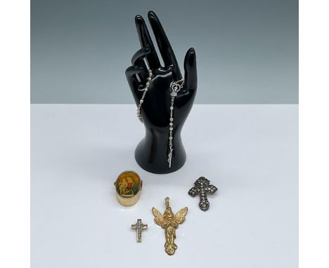 This lot includes five religious-themed items, highlighted by a gold-tone filigree pillbox that serves as a keeper for a 14"L
