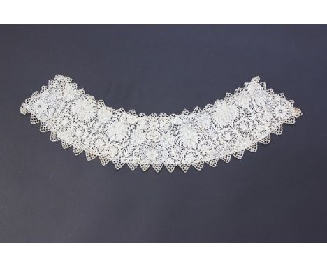 A needlepoint collar and two similar joined lengths, Italian, 2nd quarter 17th century, worked with palmettes, C-scrolls and 