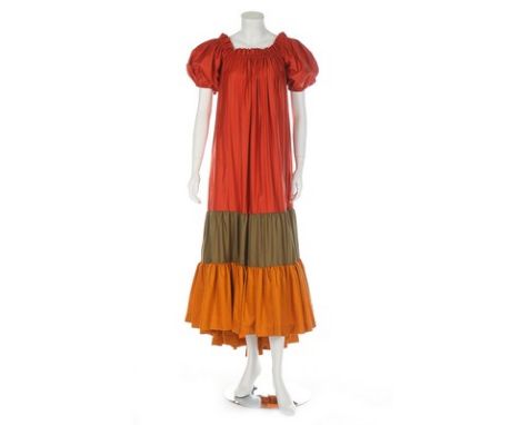 An Yves Saint Laurent Rive Gauche orange satinised cotton smock, probably Russian collection, 1970s, labelled size 42; togeth