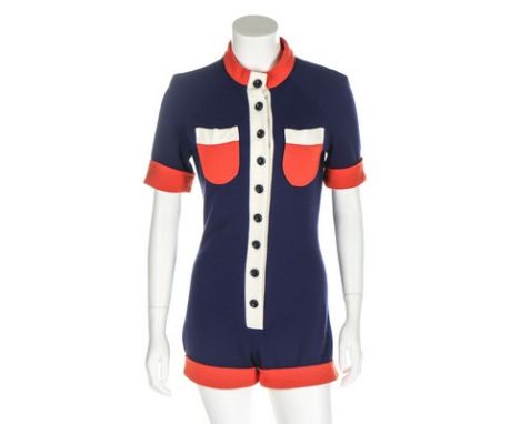 A Mates at Irvine Sellars navy jersey romper suit, late 1960s, labelled, with contrasting red and white edges, two front brea