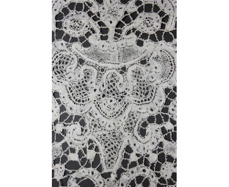 A deep alb flounce of Milanese bobbin lace, 18th century, with overall design of repeat palmettes linked by picot brides, 27 