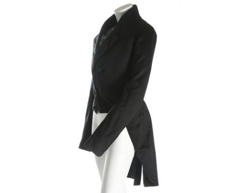 A man's black Melton wool tailcoat, American, late 1840s, with M-notched lapels, slender lower lapels, cord covered buttons, 