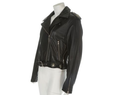 A Harley Davidson leather biker jacket, labelled, with western-style metal medallions, multiple zips, chest 96cm, 38in (2) CO