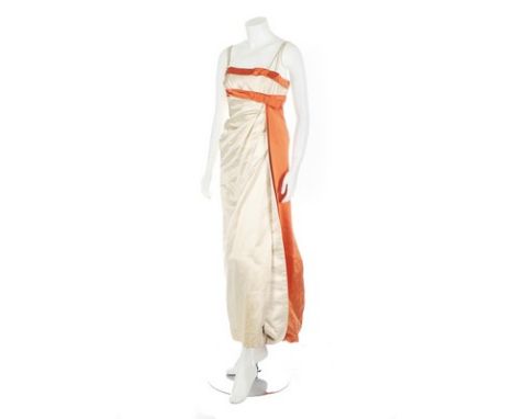 A Jean Desses ivory and orange satin evening gown, late 1950s, Paris pret a porter label, 'specially for Maria Carine', the c