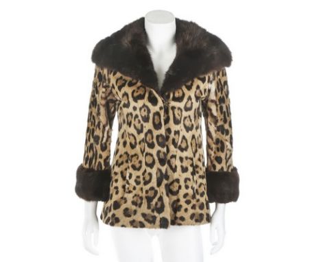 A jaguar fur jacket, 1950s, panthera onca, labelled 'S.Jaffa Furs Ltd, Belfast & Aberdeen', with mink collar and cuffs, chest