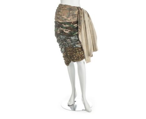 A Comme des Garçons camouflage print skirt, Spring-Summer, 2006, ribbon label and size S, formed from Desses style drapes of 
