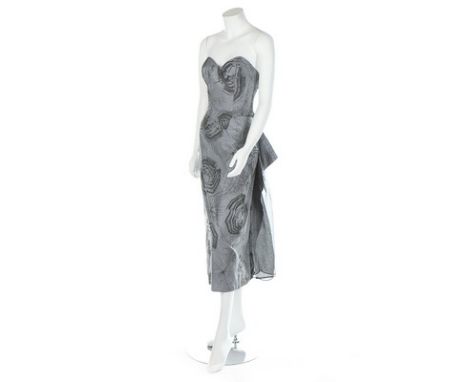 A Sarah Whitworth skeleton print grey cotton ensemble, 1983, labelled, the corset- bodice with shirred sides, the slender ski