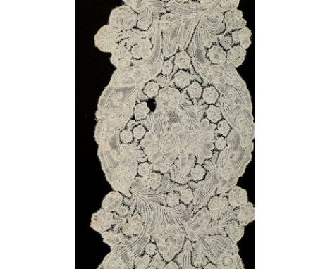 A pair of Brusselss bobbin lace lappets, early 18th century, un-joined, each 10 by 43cm; together with two shaped cap backs, 