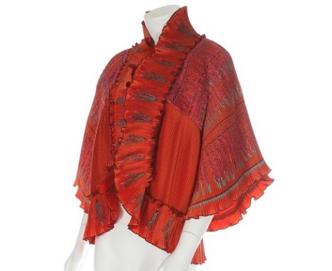 A Zandra Rhodes 'Indian Feather Sunprint' jacket, circa 1974, labelled and size 10, of pleated orange rayon; together with a 