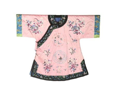 A woman's embroidered pink satin informal robe, changfu, Chinese, 1920s, worked with flowers and butterflies and dragon to fr