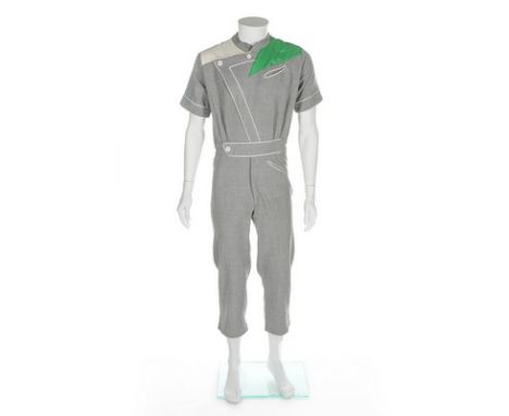 A rare and early Chrissie Walsh man's grey worsted jumpsuit, 1975, printed ribbon label, piped in white cord, with shoulder p