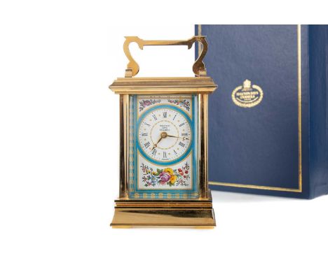 HALCYON DAYS ENAMELS CARRIAGE CLOCK,with eight day movement, the chapter ring set with Roman numerals, over a floral bouquet 