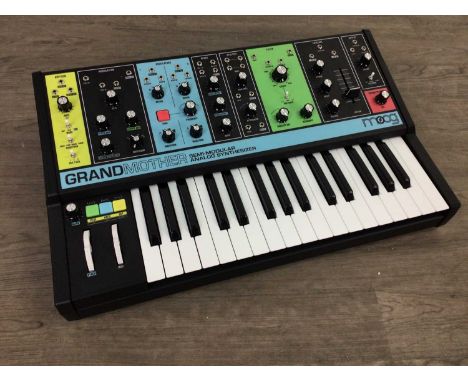 MOOG SEMI-MODULAR ANALOG SYNTHESIZER,with power cable and user's manual, in fitted hard caseThe Moog turns on, and appears in