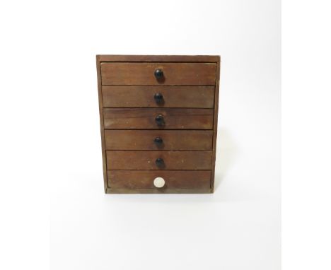 A vintage pine six drawer collectors/specimen cabinet