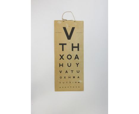 A vintage hanging eye chart/test card by Curry &amp; Paxton Ltd, 50cm x 21cm