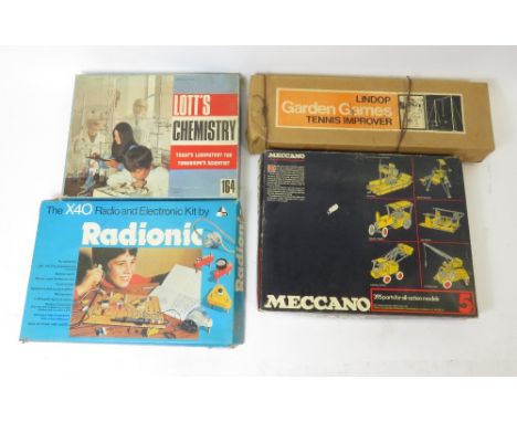 A collection of games including Subbuteo table soccer, scalextric and various others