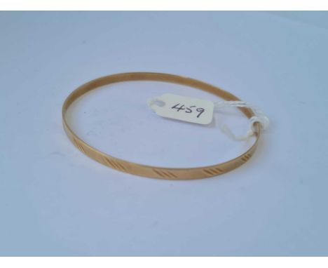 A 9ct bangle - 5.7 gms 