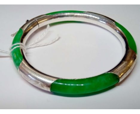 A silver and jade bangle 