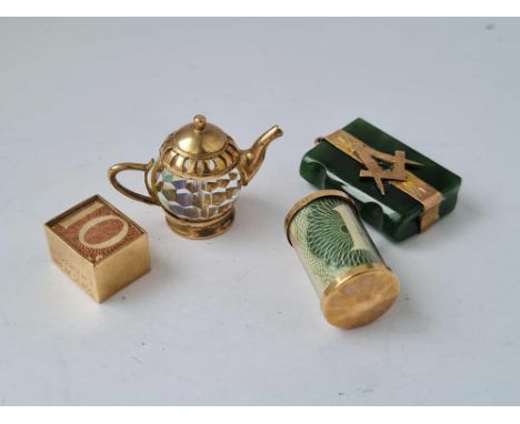 A jade masonic fob and three charms all 9ct - 27.2 gms 