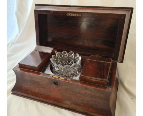 A early Victorian rosewood tea caddy with glass mixing bowl