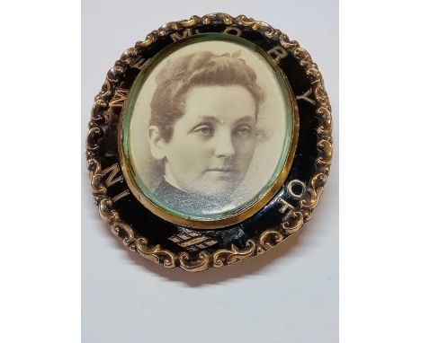 A large 19th century gold and enamel mourning brooch AF 