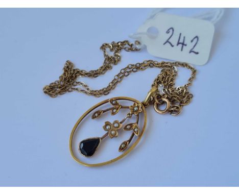 A garnet and seed pearl pendant necklace 9ct - 3.7 gms 