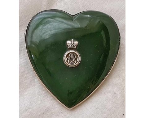 A silver mounted and jade stationary clip heart shaped from Tonnel of Paris 2 1/2 inches wide 