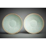 A pair of Chinese qingbai moulded bowls