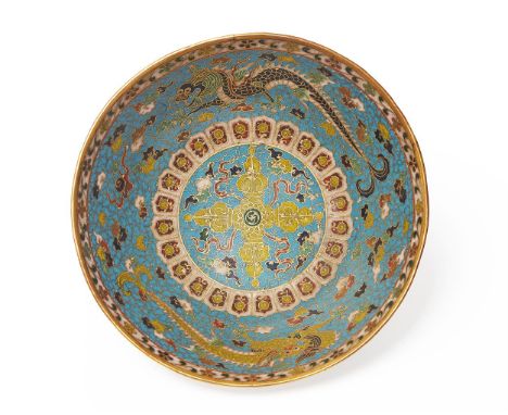 A Chinese cloisonné bowl, Qing Dynasty, 19th century, in Ming Style, the interior with two dragons and the centre with a Tibe