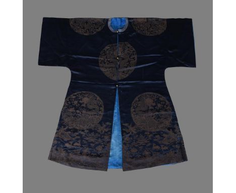 A rare and unusual Chinese silk brocade robe, 18th century, woven with four front facing four-clawed dragons, mang, and four 