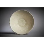 A Chinese moulded 'Ding' type bowl
