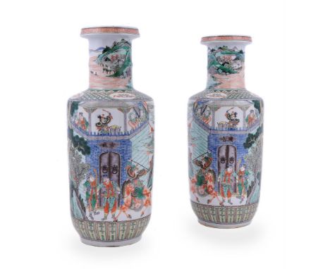 A pair of Chinese Famille Verte rouleau vases, Qing Dynasty, 19th century, depicting a continuous scene of warriors guarding 