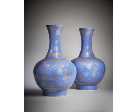 A pair of Chinese gilt-decorated blue ground bottle vases, Guangxu four character mark and probably of the period, the globul